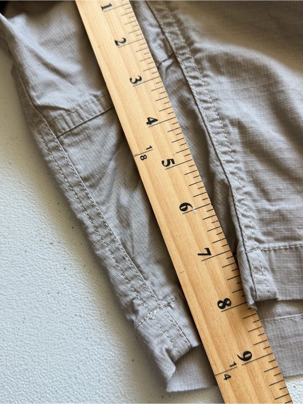 Vuori Ripstop Shorts in a sesame beige color, featuring elastic drawstring waist - Picture 10 of 12
